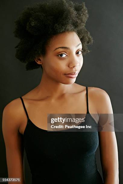 close up of smirking black woman - woman vest stock pictures, royalty-free photos & images