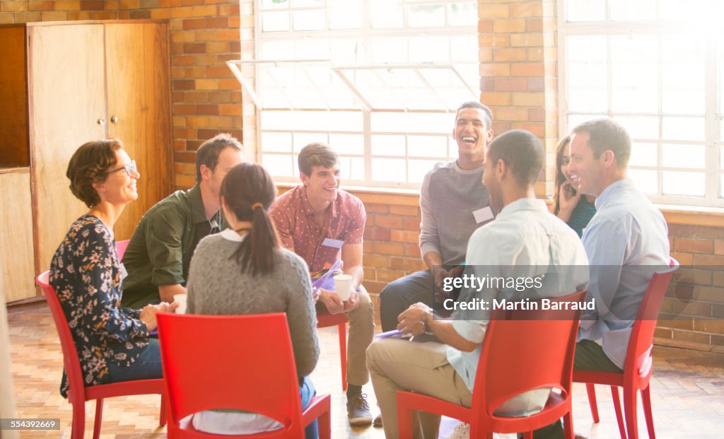 People in circle enjoying group therapy session