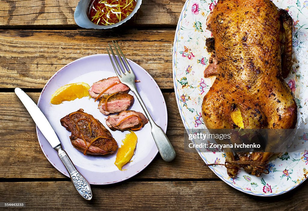 Duck baked with oranges