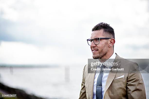 early 30's male stood by the norfolk broads - tie pin stock pictures, royalty-free photos & images