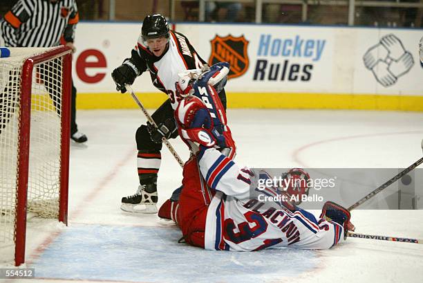 Marty Murray of the Philadelphia Flyers has his shot blocked by goaltender Dan Blackburn of the New York Rangers during the game at Madison Square...