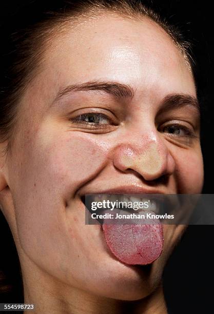 female with tongue out, pressed against glass - distorted body image stock pictures, royalty-free photos & images