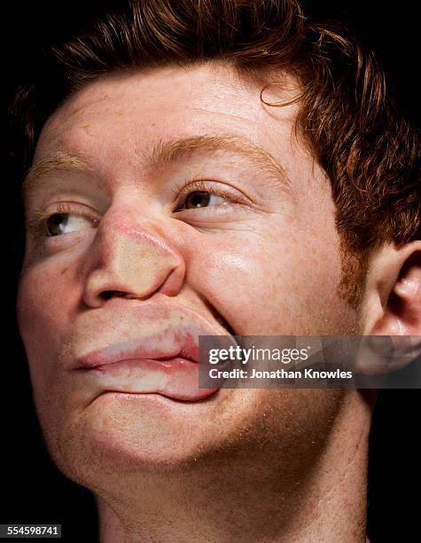 man's face pressed against glass - push stock pictures, royalty-free photos & images