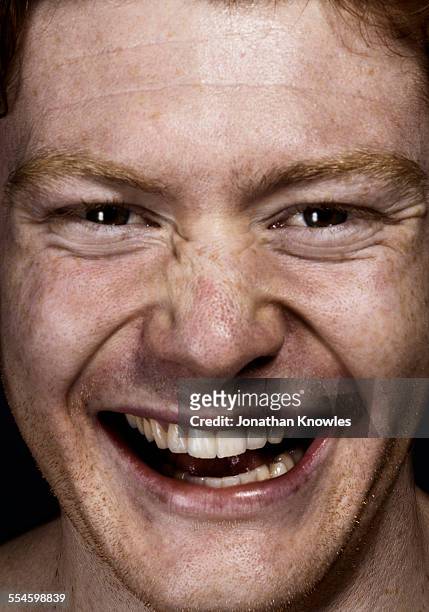 portrait of a man laughing - mouth fotografías e imágenes de stock