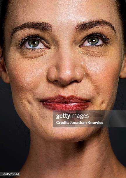 female crying with joy - teardrop imagens e fotografias de stock