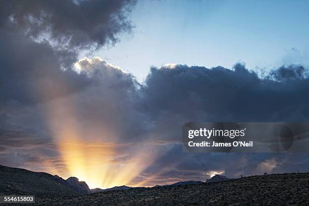 sun rays and dramatic clouds - positive thinking stock pictures, royalty-free photos & images