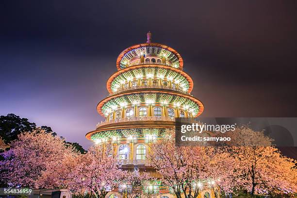 temple and sakura by night - taipei foto e immagini stock