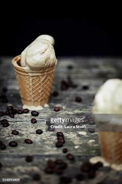 mocha ice cream cones and roasted coffee beans - mocha ice cream stock pictures, royalty-free photos & images