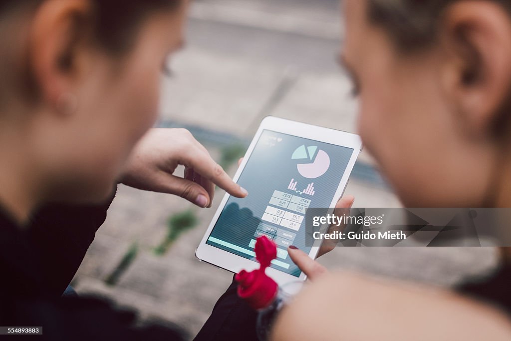 Woman checking self tracking app