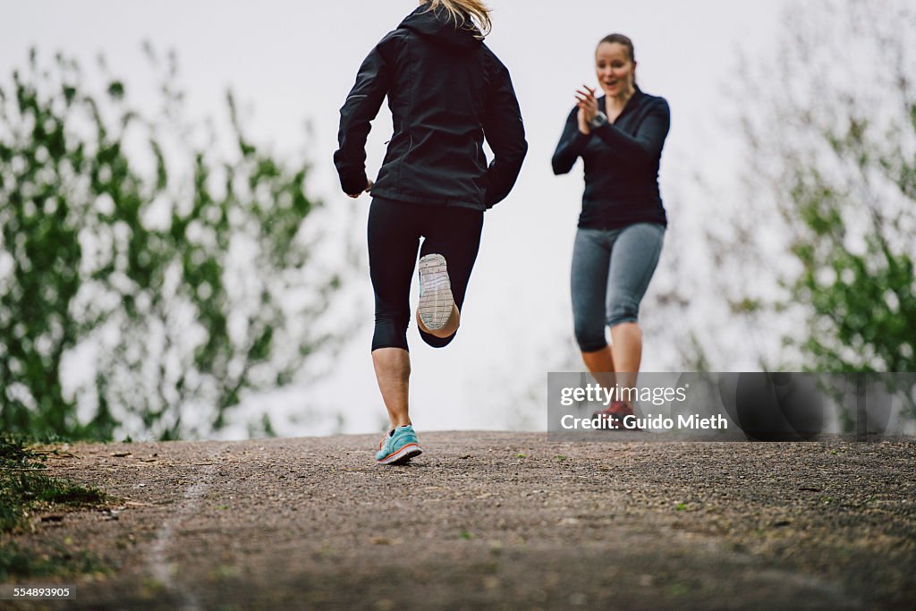 Women running together
