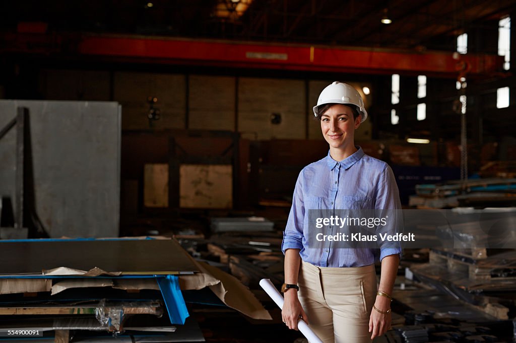 Portrait of female architect wering hard hat