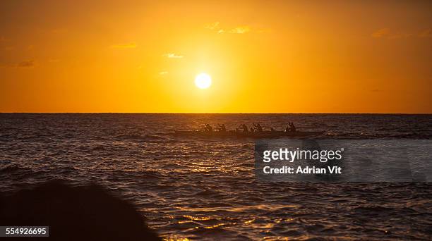 sunset canoe - waianae_hawaii stock pictures, royalty-free photos & images