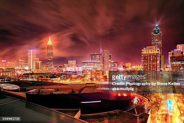 a rainy night in atlanta - centenial olympic park stock pictures, royalty-free photos & images