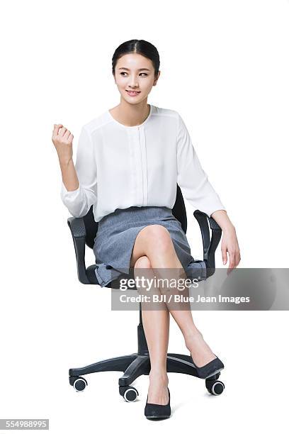 young businesswoman sitting on chair - ceo white background stock pictures, royalty-free photos & images
