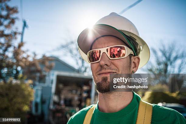 portrait of solar panel installation crew member - denver house stock pictures, royalty-free photos & images