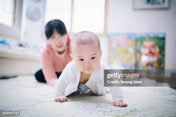 happy smiling baby boy - asian baby stock pictures, royalty-free photos & images