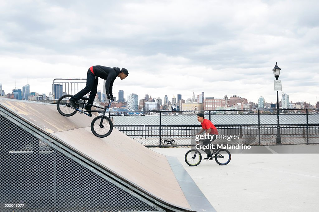 Two teenagers riding their BMX near New York City