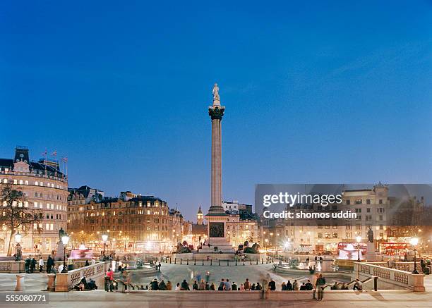 trafalgar square at dusk - trafalgar square stock pictures, royalty-free photos & images