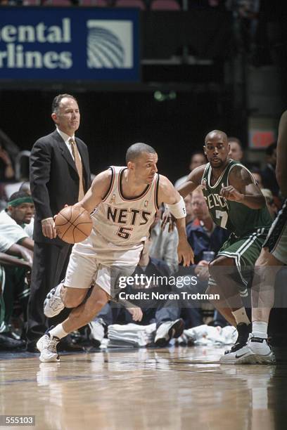 Guard Jason Kidd of the New Jersey Nets dribbles the ball around guard Kenny Anderson of the Boston Celtics during the NBA game at the Continental...