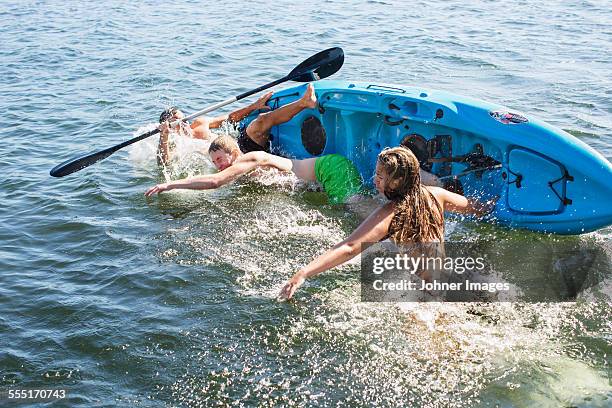 teenagers kayaking - kayaking stockholm stock pictures, royalty-free photos & images