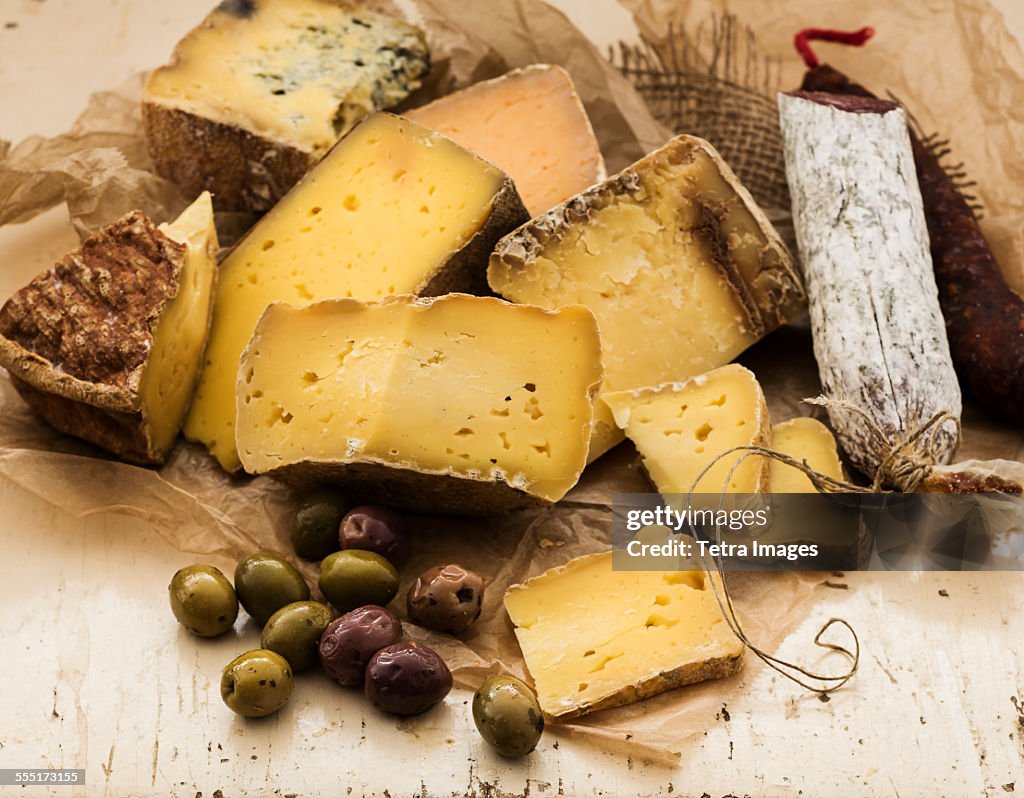 Selection of cheese on wooden table, studio shot