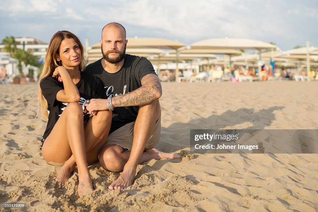 Young couple together on beach