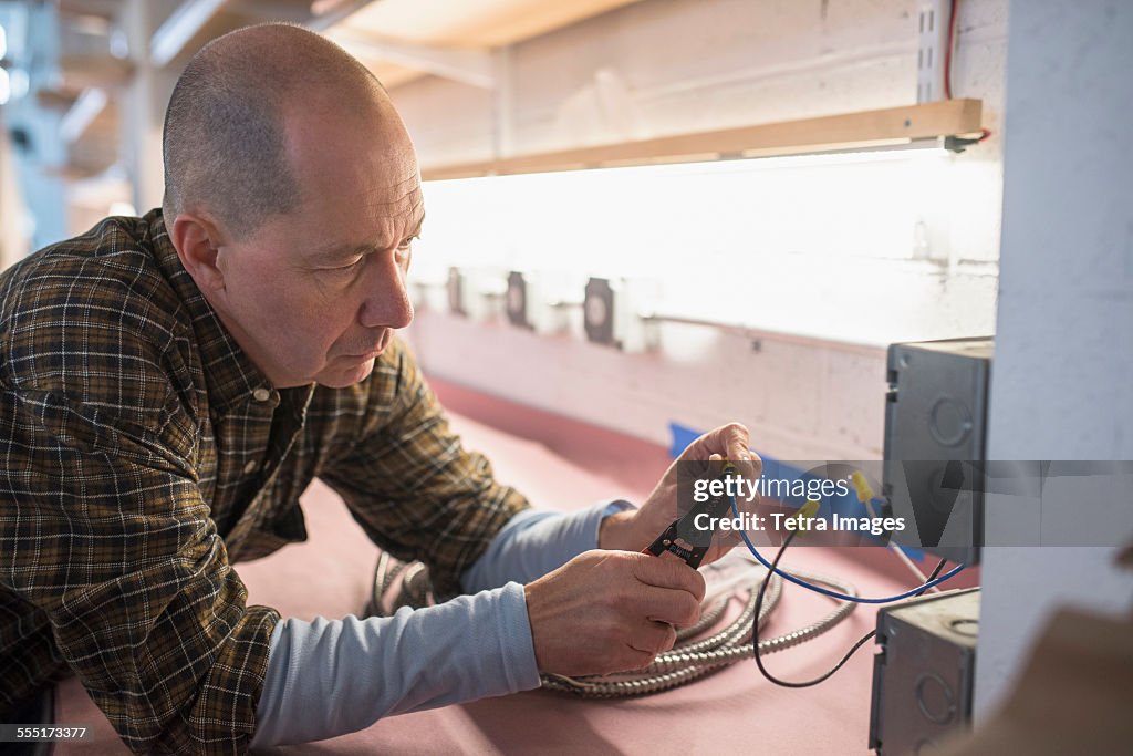 Electrician fixing wires