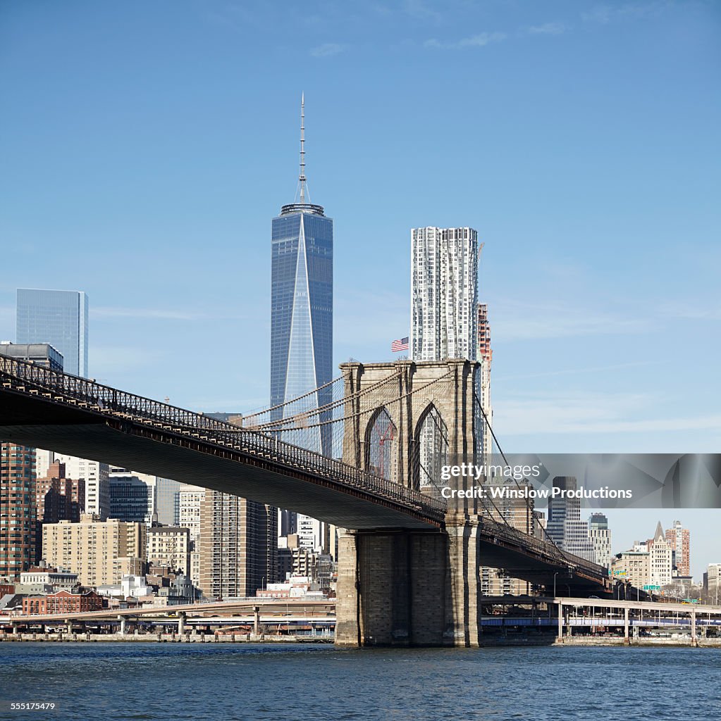 USA, New York State, New York City, Brooklyn, View of suspension bridge and cityscape