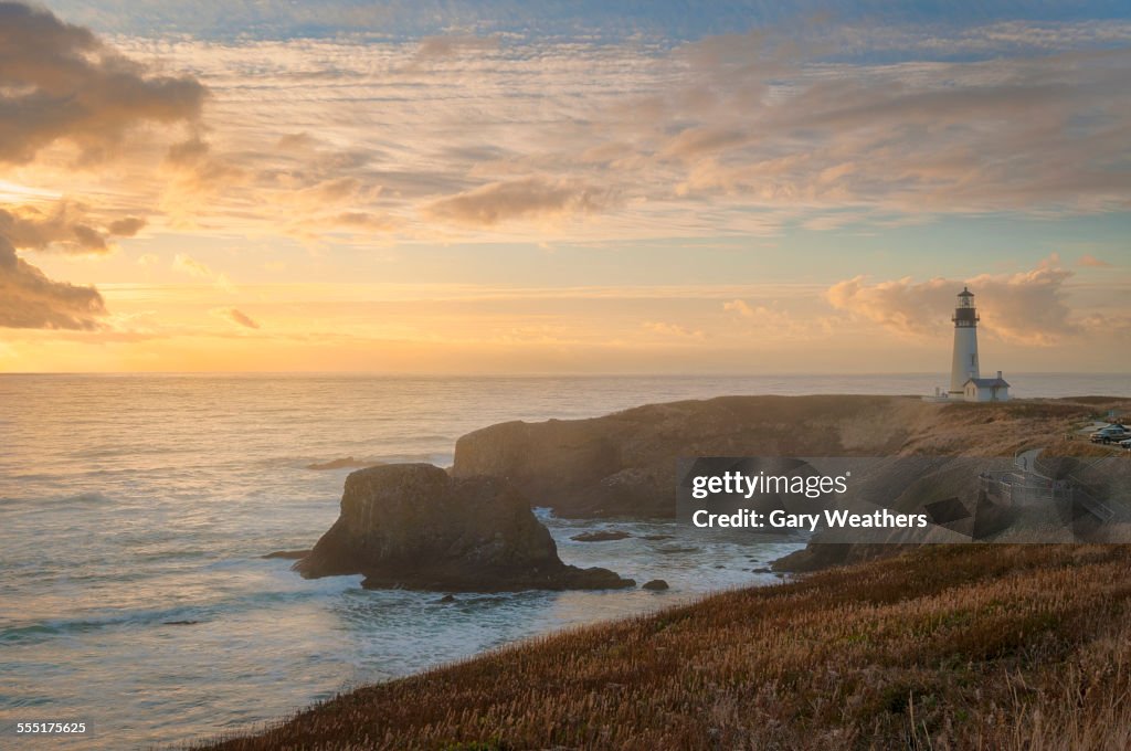 USA, Oregon, Yaquina Head Light house, Scenic view of lighthouse at sunset