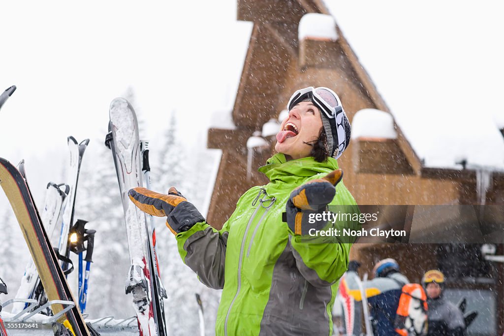USA, Montana, Whitefish, Portrait of woman enjoying snow