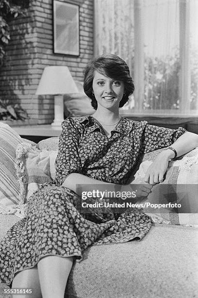 English journalist and presenter on the TV-am breakfast television show Good Morning Britain, Anne Diamond pictured sitting on the sofa in Breakfast...