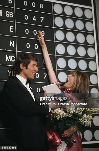 English pop singer Sandie Shaw at the scoreboard after winning the Eurovision Song Contest with her performance of 'Puppet On A String', at the...