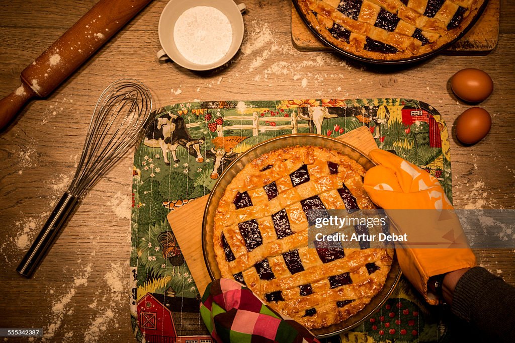 Preparing strawberry jam pie at home.