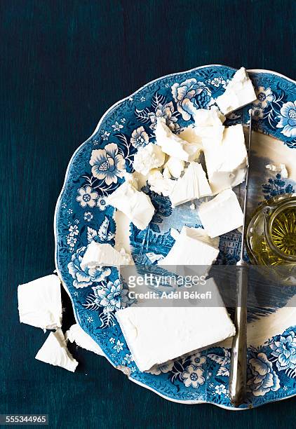 feta cheese - blue plate stock pictures, royalty-free photos & images