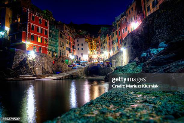 riomaggiore marina at night long exposure - riomaggiore stock pictures, royalty-free photos & images