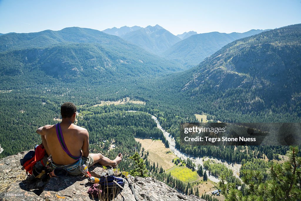 A rock climber at the summit