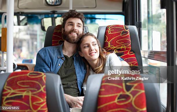 happy couple on a bus - buenos aires travel stock pictures, royalty-free photos & images