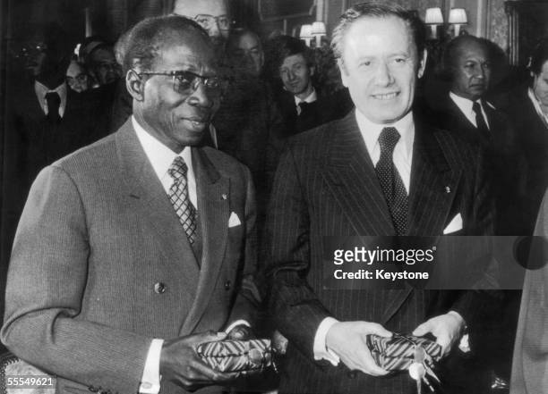 President of Senegal, Leopold Sedar Senghor with President Gaston Thorn of Luxembourg after they jointly received the Eurafrique '78 award for...