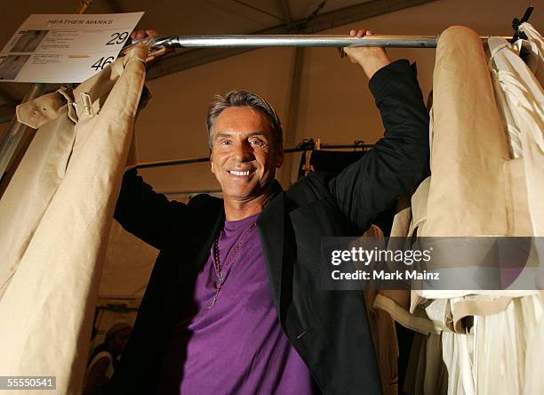Designer Wolfgang Joop gets ready backstage at the Wunderkind by Wolfgang Joop Spring 2006 fashion show during Olympus Fashion Week in Bryant Park...