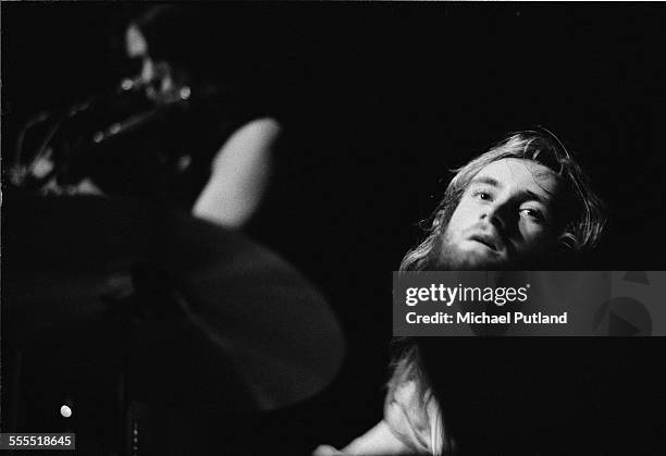 Drummer Phil Collins performing with English progressive rock group Genesis, London, 1971.