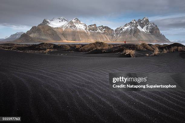 black sand texture and famous vestrahorn - black sand stock pictures, royalty-free photos & images