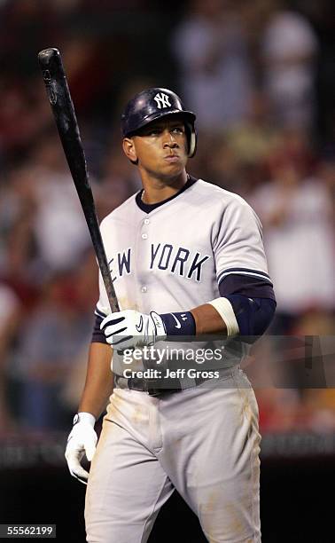 Alex Rodriguez of the New York Yankees warms up on deck during the game with the Los Angeles Angels of Anaheim at Angel Stadium on July 23, 2005 in...