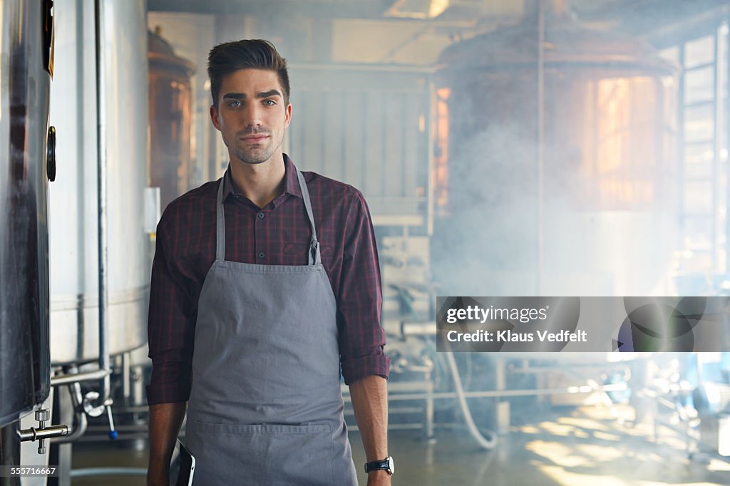 Portrait of entrepreneur at microbrewery