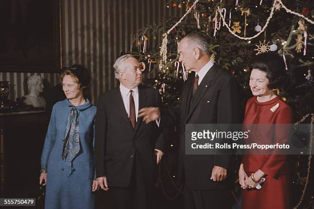 Prime Minister of the United Kingdom, Harold Wilson and his wife Mary Wilson stand with President of the United States, Lyndon B. Johnson and his...