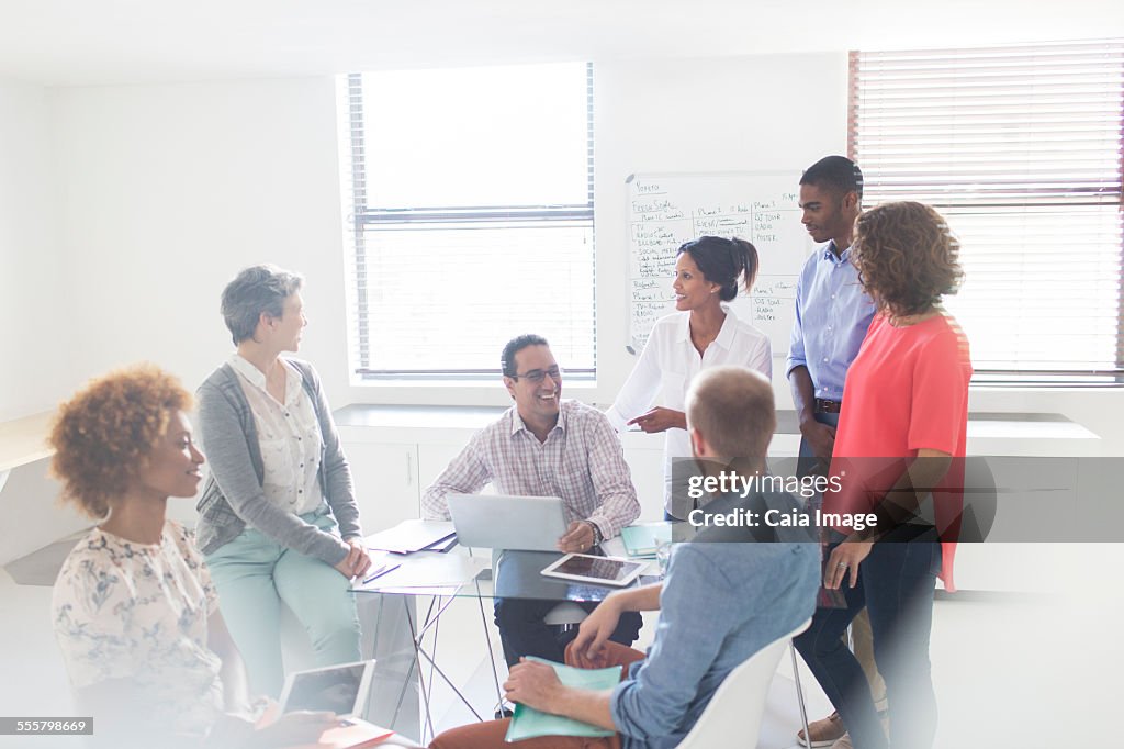 Group of business people having meeting in modern office