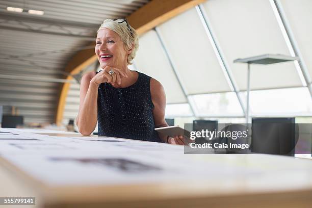 Businesswoman using digital tablet in office