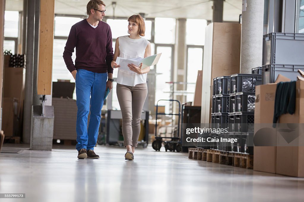 Business people walking in office