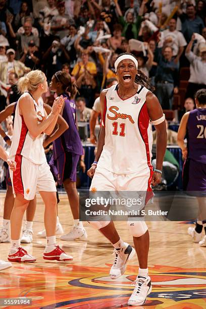 Taj McWilliams-Franklin of the Connecticut Sun celebrates after winning Game Two of the 2005 WNBA Finals against the Sacramento Monarchs on September...