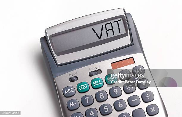 vat written on a calculator - vat imagens e fotografias de stock