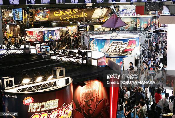 People crowd around booths at the Tokyo Game Show in Makuhari, suburban Tokyo, 16 September 2005. One hundred thirty-one companies are taking part in...